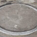 trabajadores en base de tanque